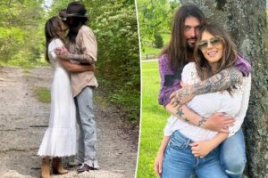 Elizabeth Hurley, Billy Ray Cyrus passionately kiss as surprise romance heats up